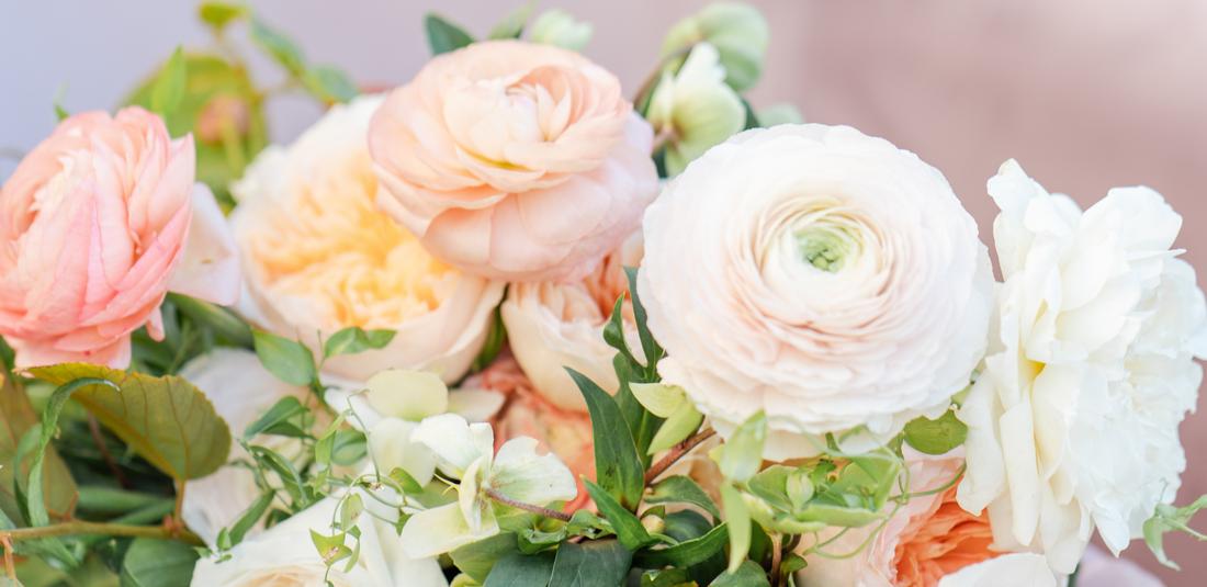 Spring wedding flowers such as ranunculus and garden roses