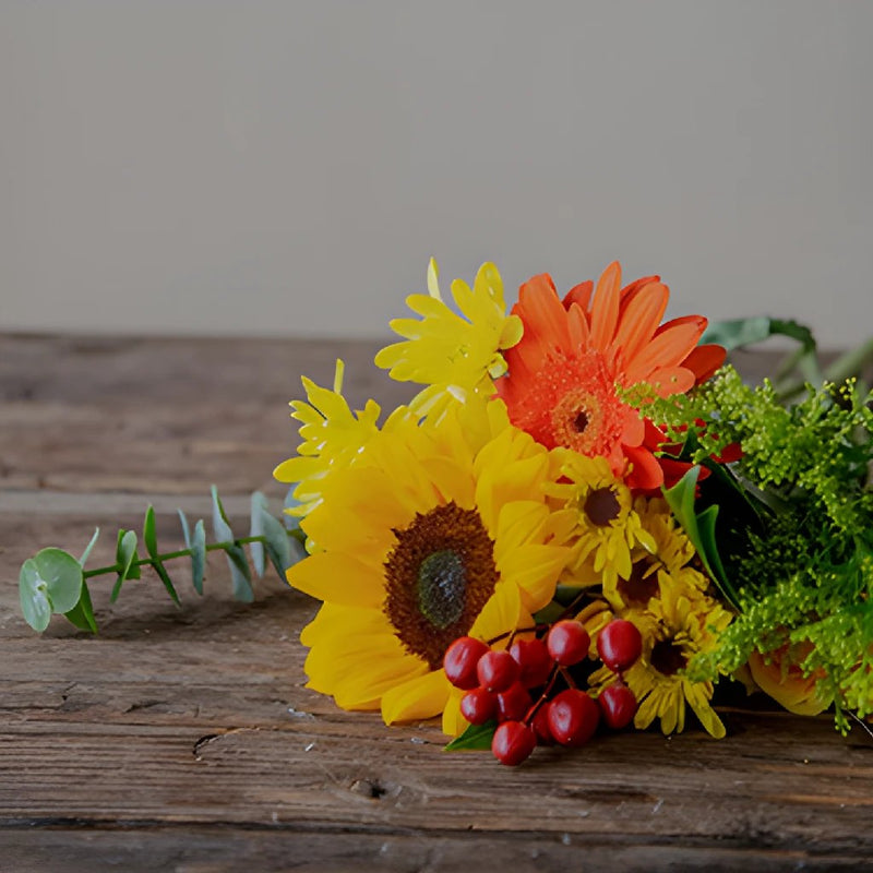Bridal Centerpieces Sunflowers and Orange Flowers